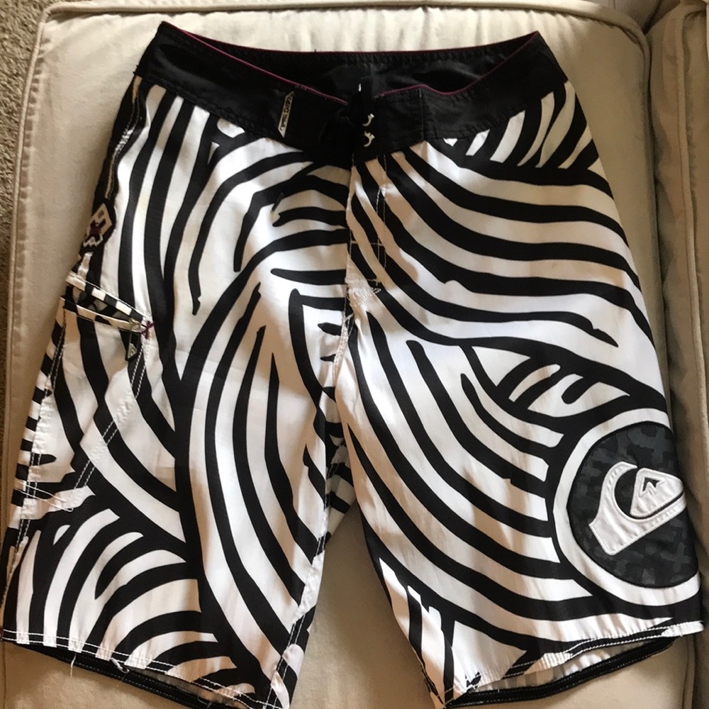 Quicksilver black and white board shorts.
